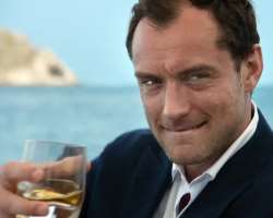 Jude Law consuming alcohol